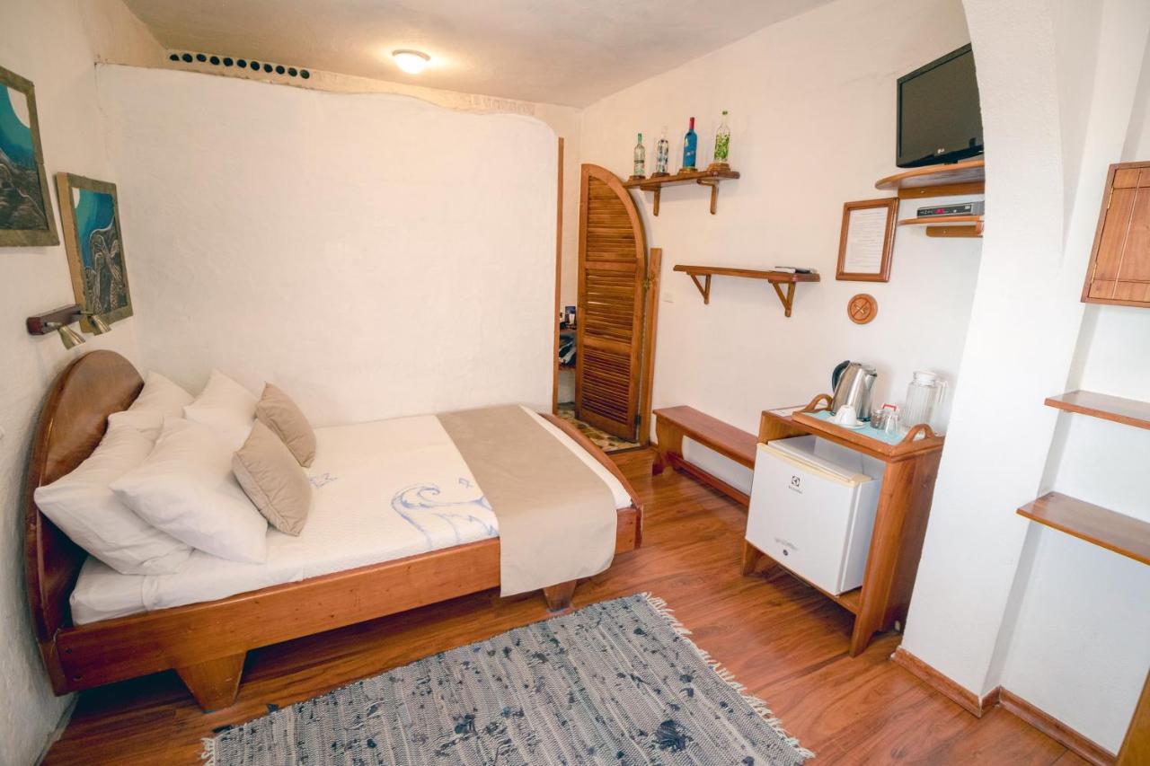 Hotel Casa Blanca ปูแอร์โต บาเกริโซ โมเรโน ห้อง รูปภาพ